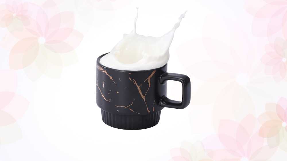 Four stackable hand crafted marble pattern mugs with rack