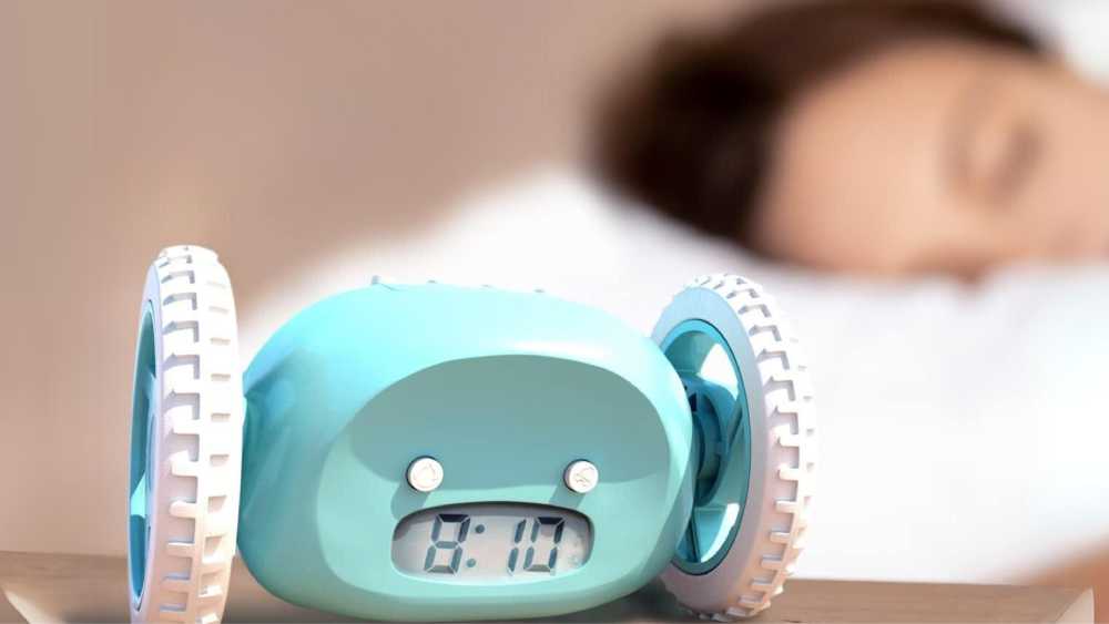 Loud alarm clock on wheels that runs away
