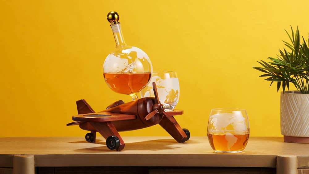 Wooden airplane stand for whiskey decanter and two glasses