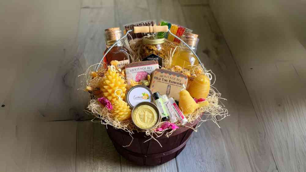Gift box containing bee products and an art print