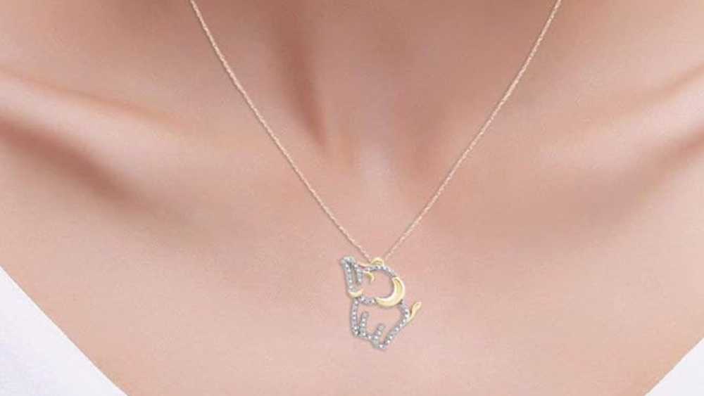 Round cut natural diamond accent two tone elephant pendant necklace