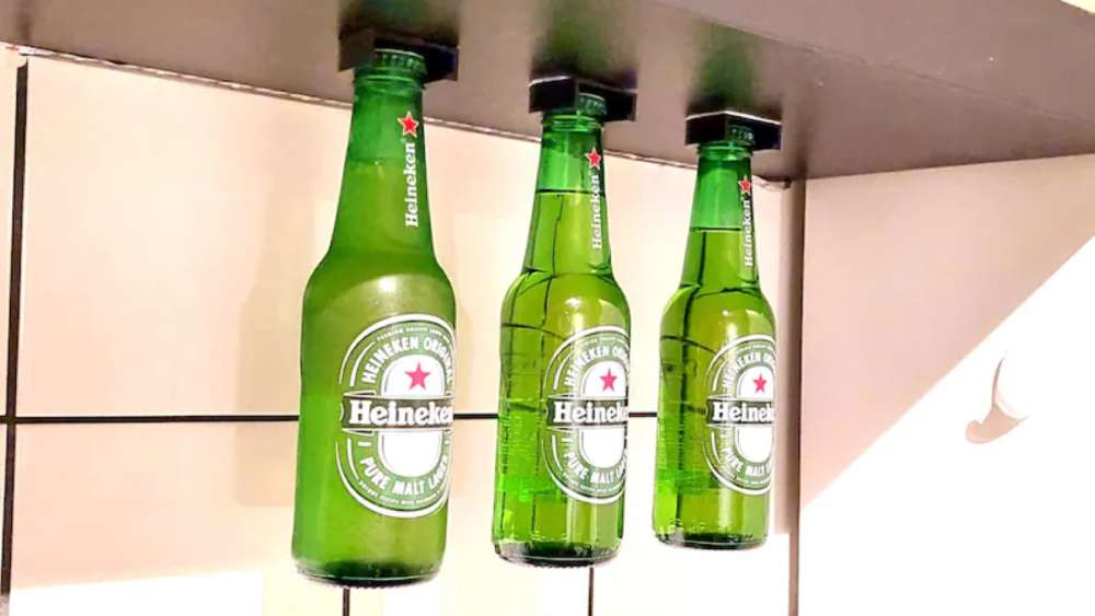 Two strip magnetic bottle hangers for six pack