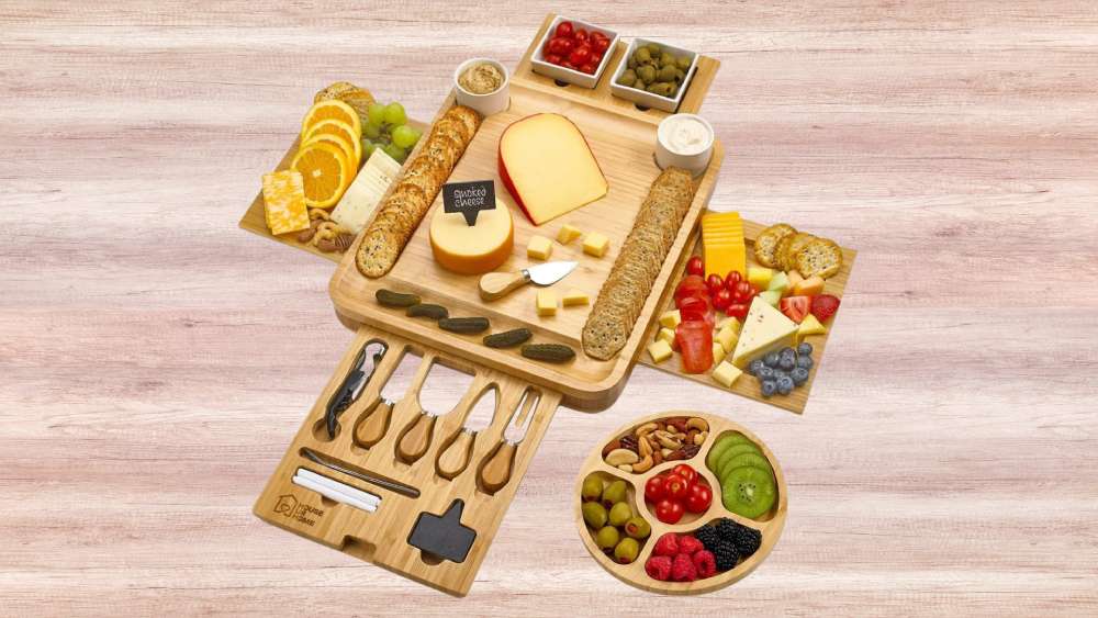 Cheese board with serving plates utensils and drawers