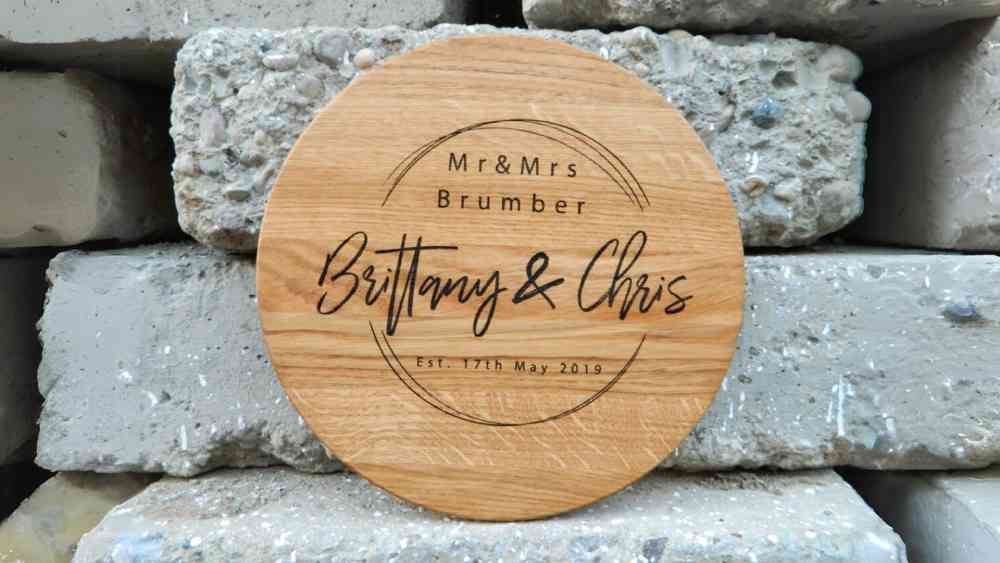 Wooden cutting board with personalized engraving of names