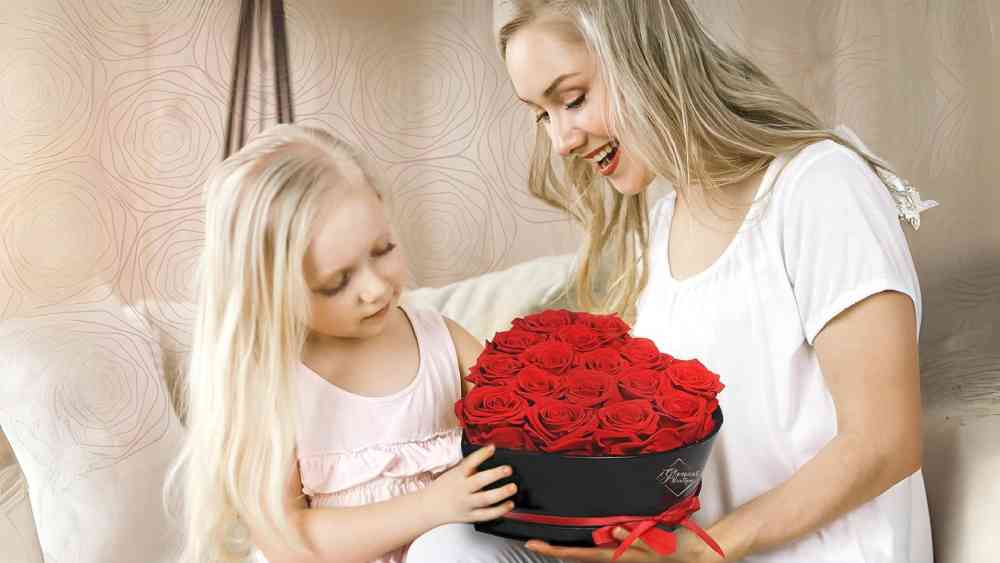 Sixteen piece preserved roses arranged in heart shape