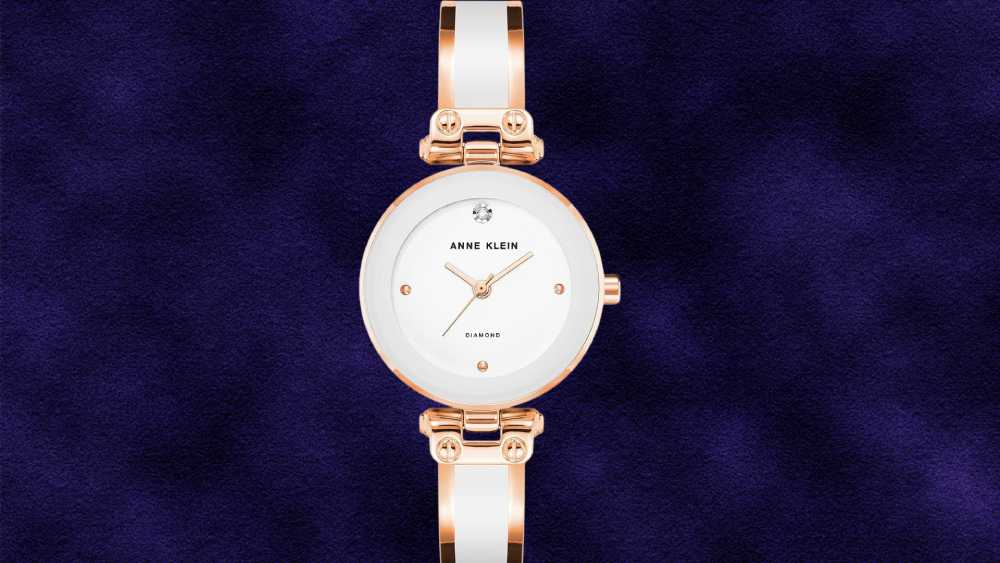 Anne Klein Women's genuine diamond dial bangle watch