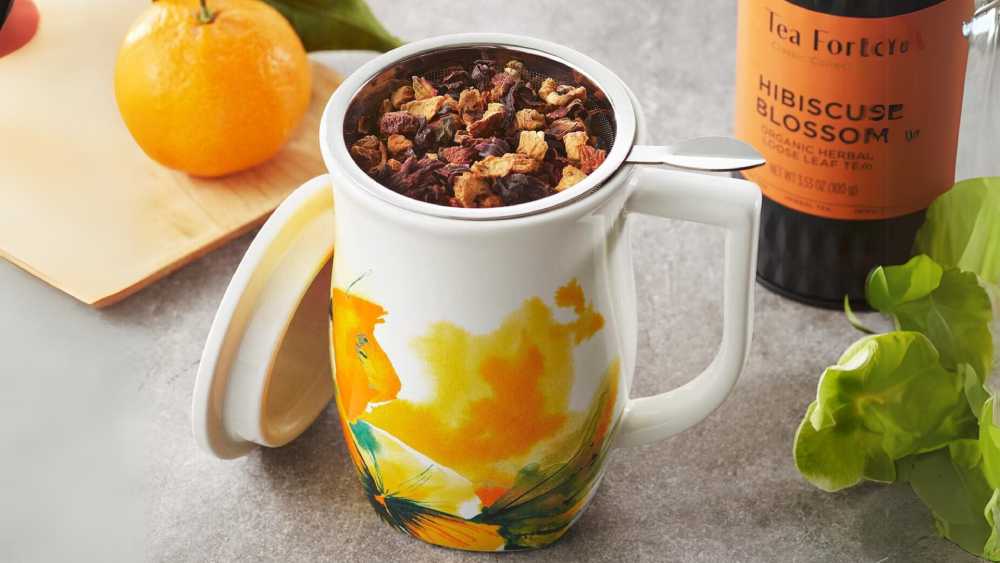 Fourteen ounce ceramic tea mug with infuser and lid