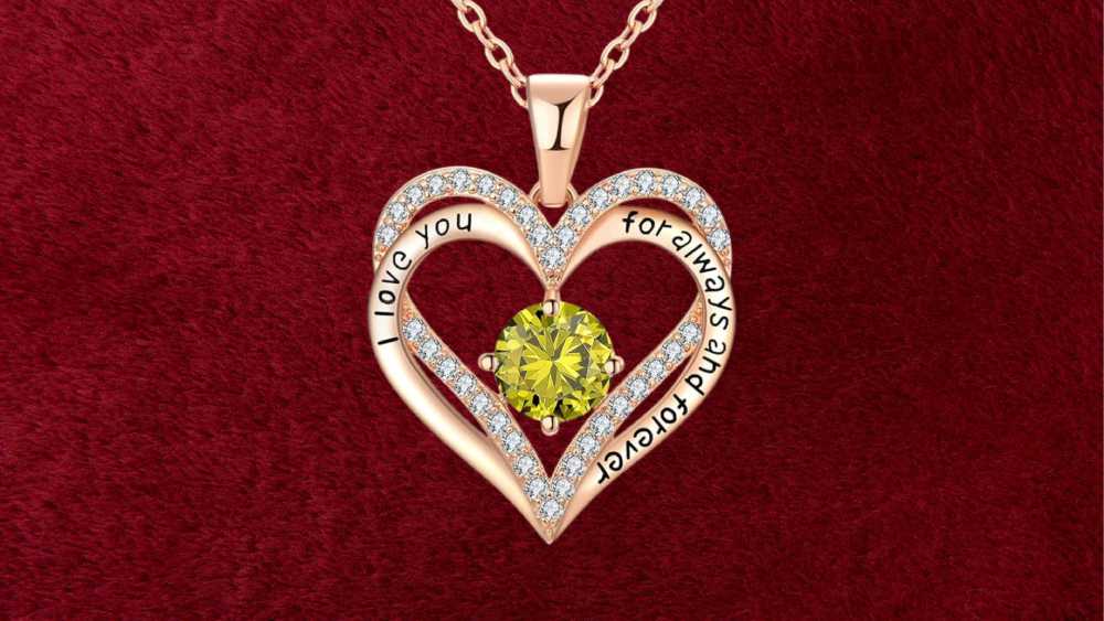 Rose gold heart pendant necklace with birthstone diamond
