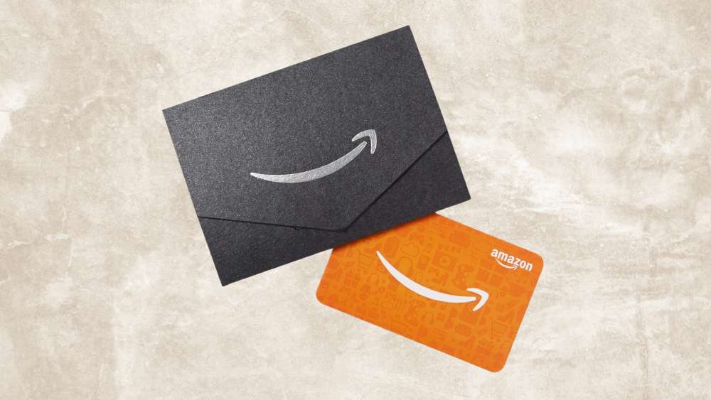 Amazon gift card in black envelope