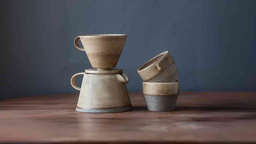 Ceramic coffee set of jug dripper and tumblers