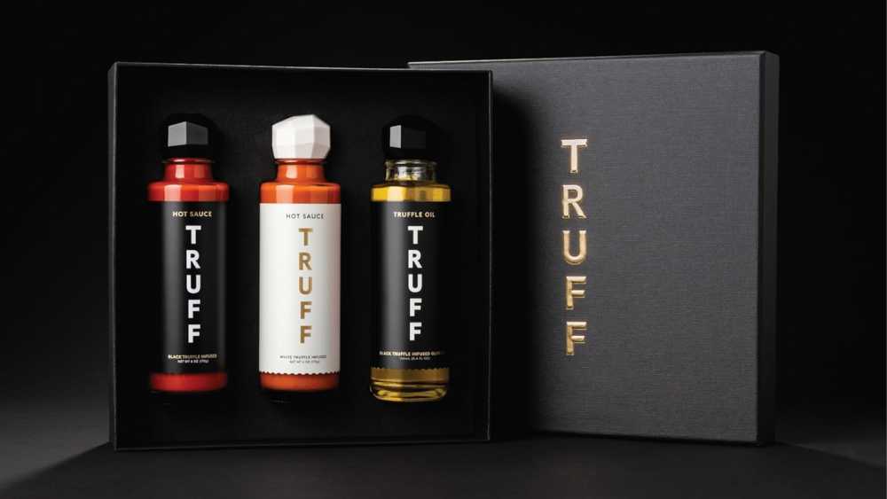 Set of three different gourmet hot sauce bottles