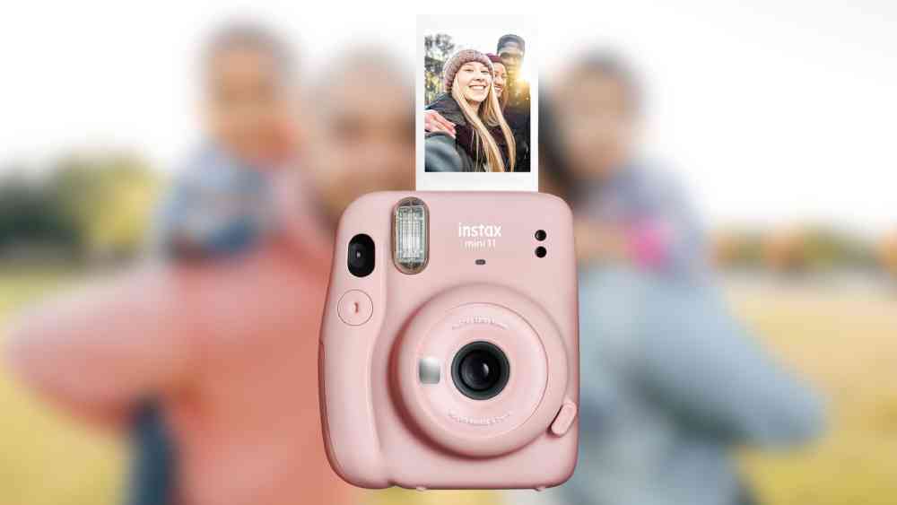 Pink colored instant camera birthday gift for girl