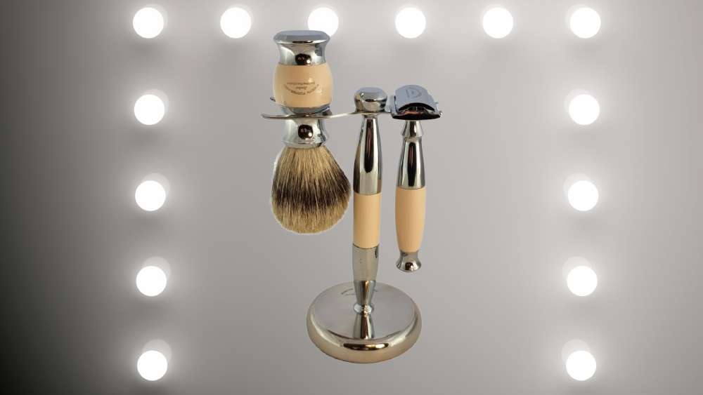 Sterling silver handled shaving razor and badger brush