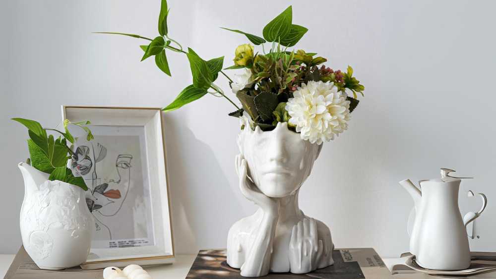White ceramic face vase