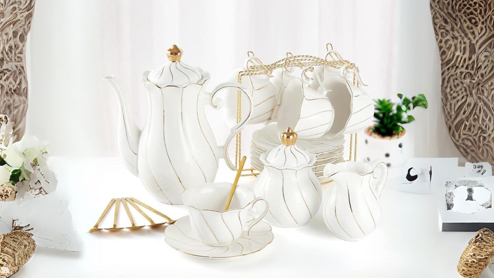 Beautiful 22 piece Porcelain Tea Set With Gold Trim