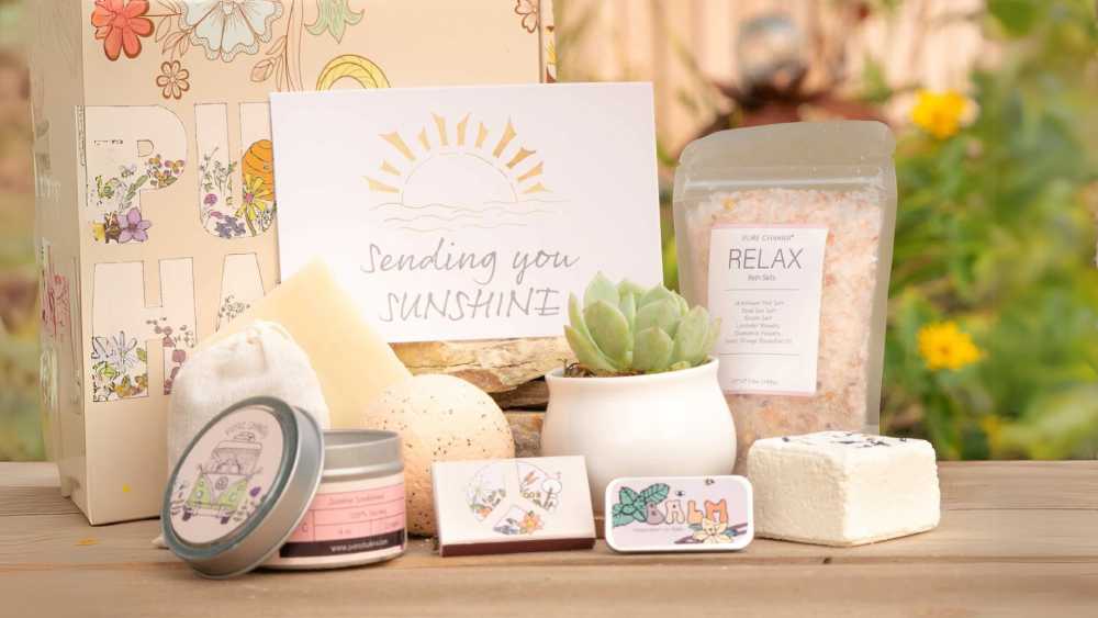Handmade succulent gift box including cozy candle