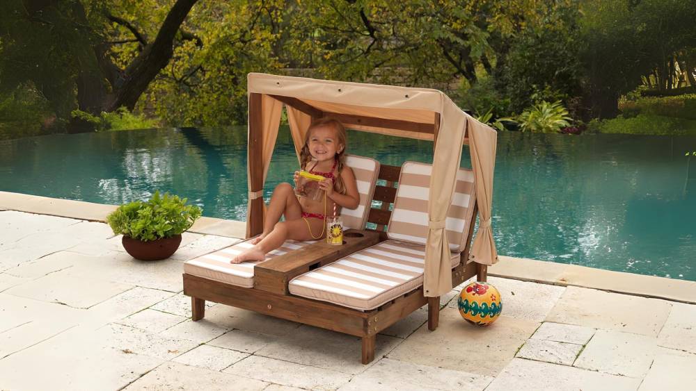 Kid-sized chaise lounge chair for relaxing outdoors