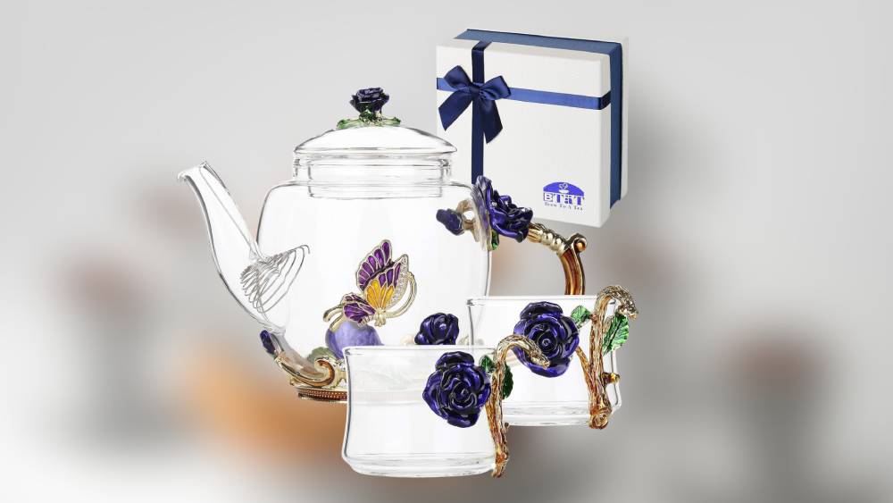 Delicate floral patterned glass tea set
