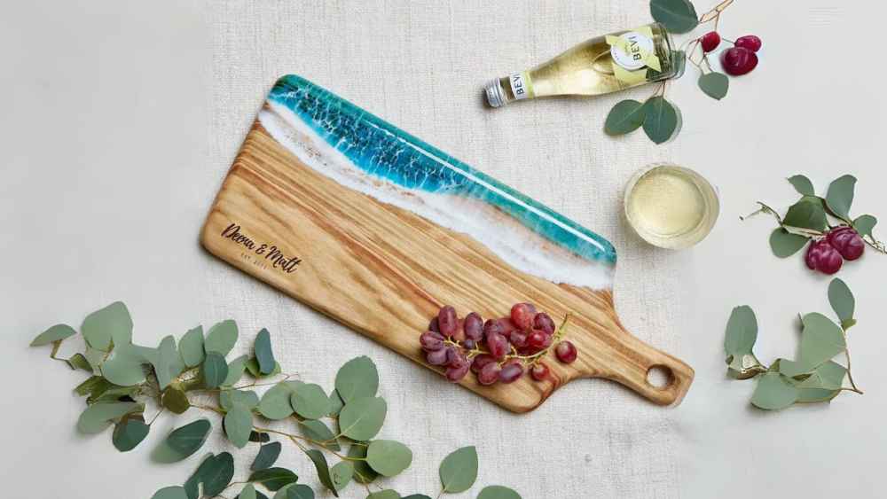 Personalized engraved wood and resin cutting board