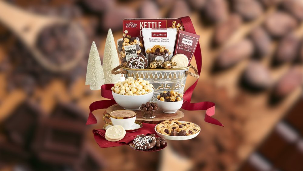 Gift basket with array of sweet and sparkling treats