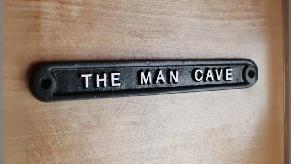 Cast metal antique design man cave sign
