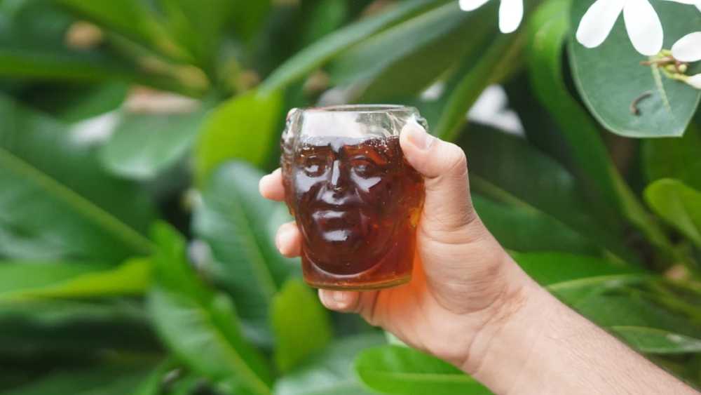 Monk face glass