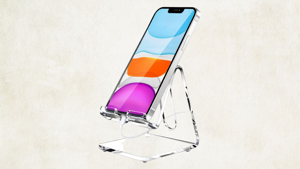 Clear acrylic stand holds cell phone