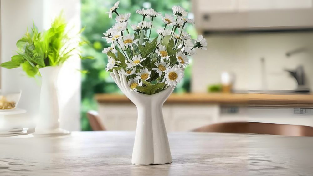 Ceramic vase shaped like holding hands